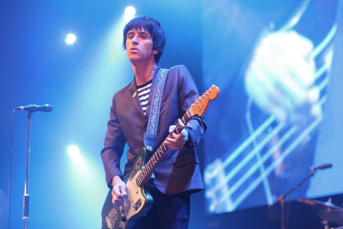 Johnny Marr performs on stage at City Live, Manchester City Football Club's Season Launch Party, at Manchester Central on 14th August 2014