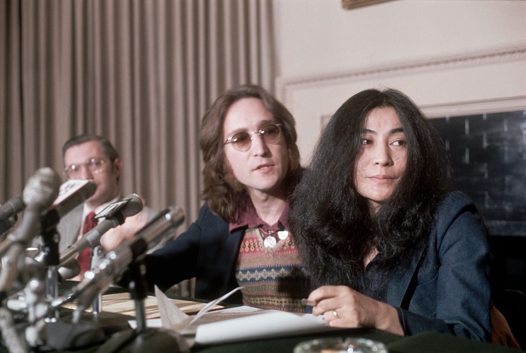 John Lennon and Yoko Ono at a press conference, 1973