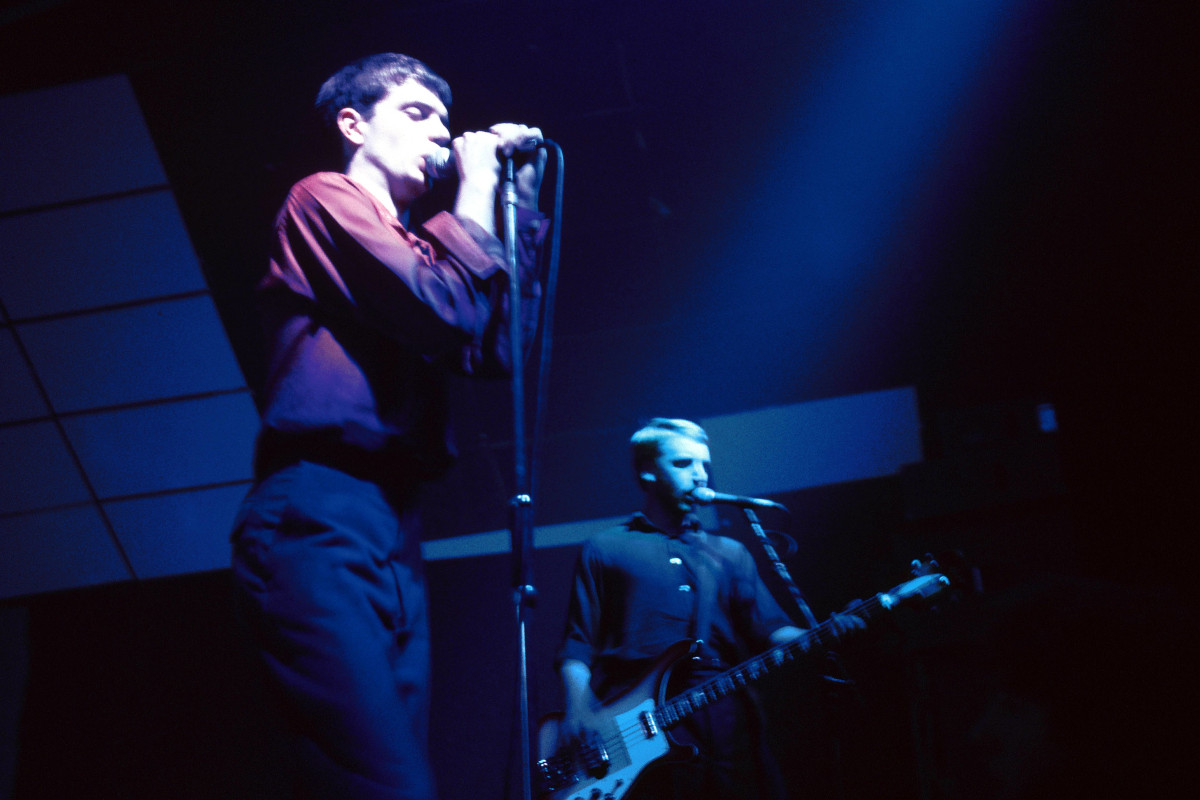 UNITED KINGDOM - ELECTRIC BALLROOM Photo of Peter HOOK and Ian CURTIS and JOY DIVISION, L-R: Ian Curtis, Peter Hook - performing live onstage