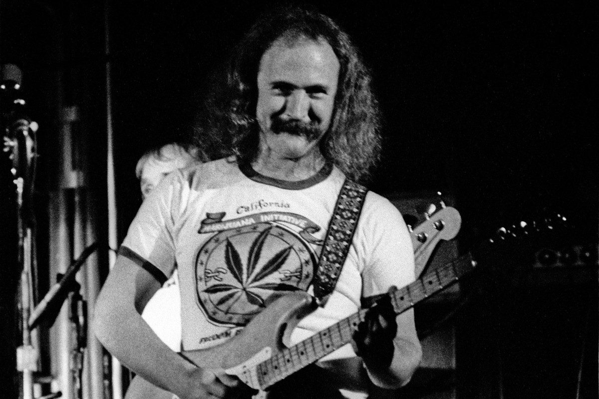 David Crosby performs with Neil Young and his band The Stray Gators at the Forum on April 1, 1973 in Inglewood, California