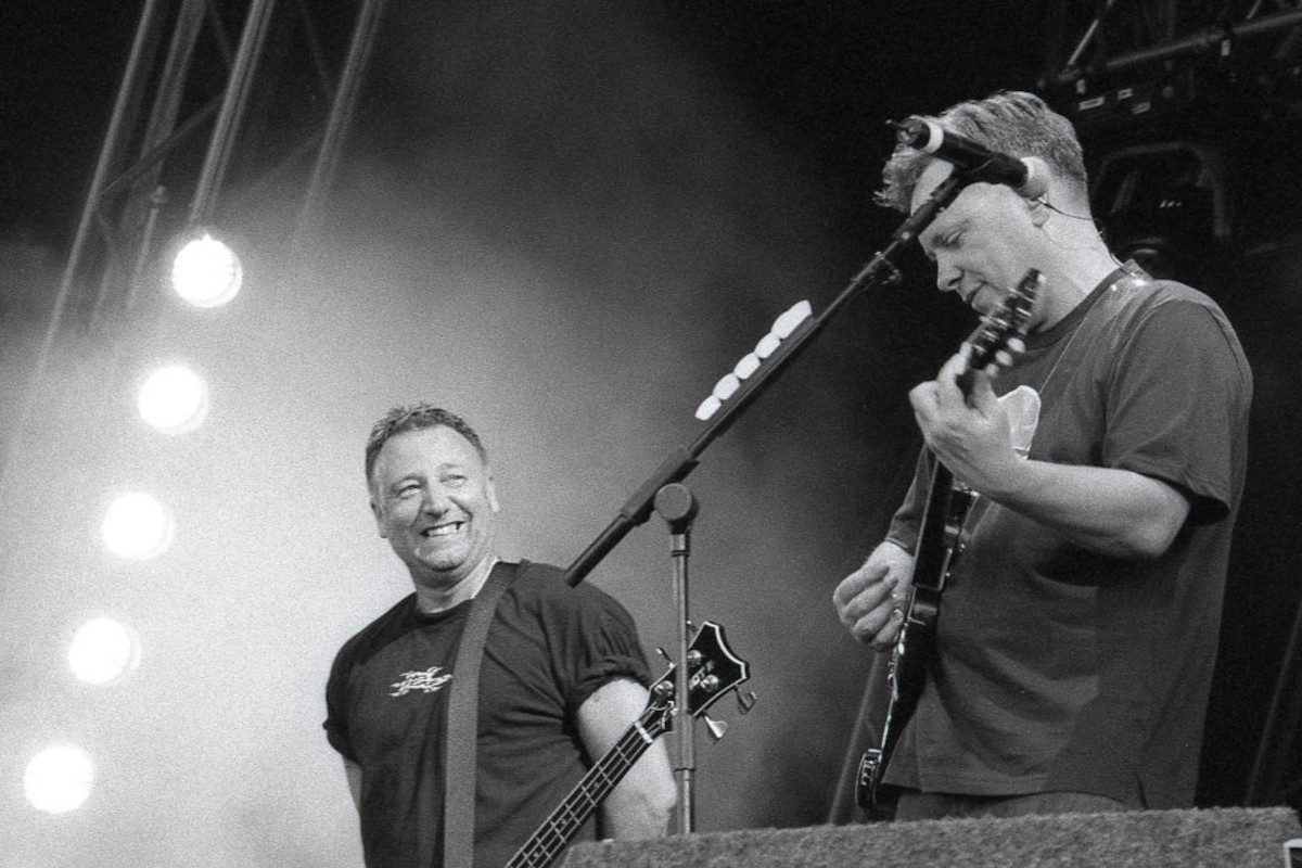 Peter Hook and Bernard Sumner of New Order performing at Finsbury Park, on June 9, 2002