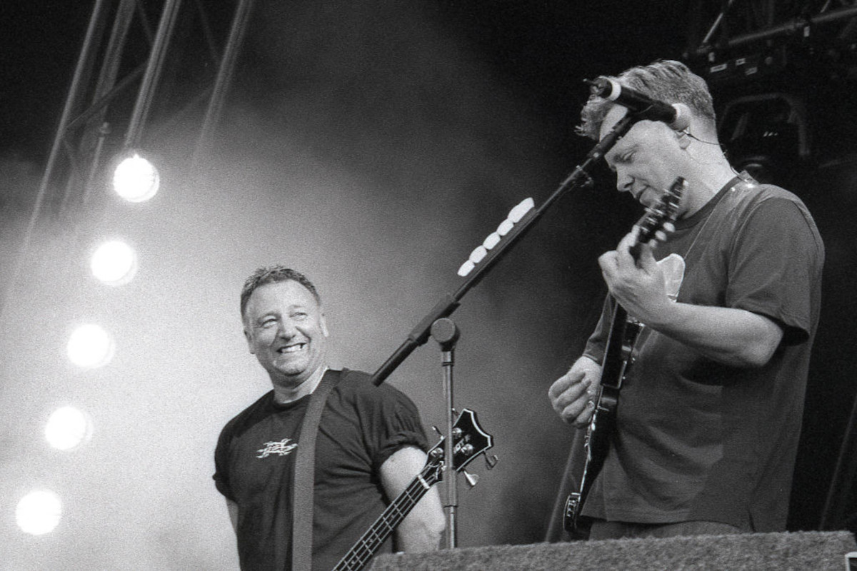 Peter Hook and Bernard Sumner of New Order performing at Finsbury Park, on June 9, 2002
