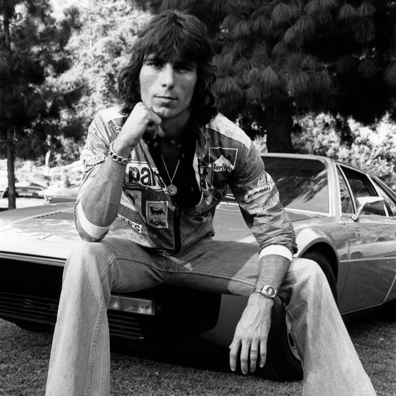 Cozy Powell sits proudly astride his Ferrari 308 at the Observatory, Los Angeles, 1977