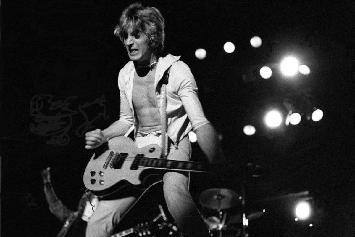 Mick Ronson performs live on stage with the Hunter Ronson band at Hammersmith Odeon in London, 31st March 1975