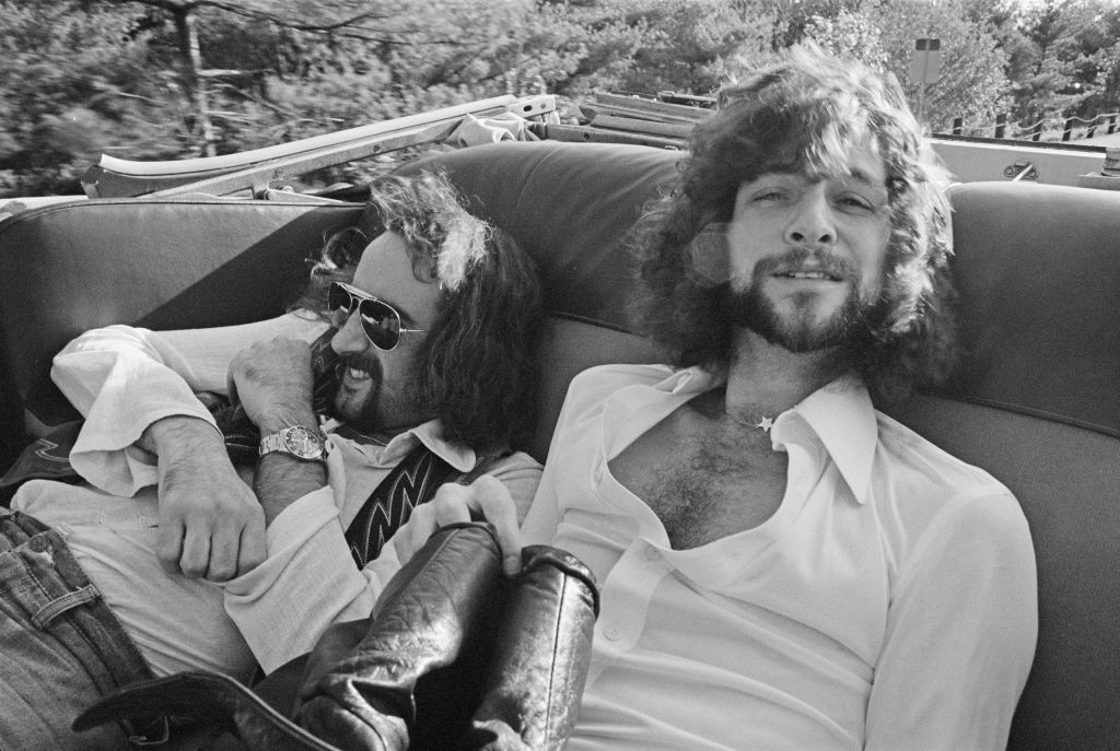Bassist John McVie (left) and guitarist Lindsey Buckingham of Fleetwood Mac outside a recording studio in New Haven, Connecticut, October 1975
