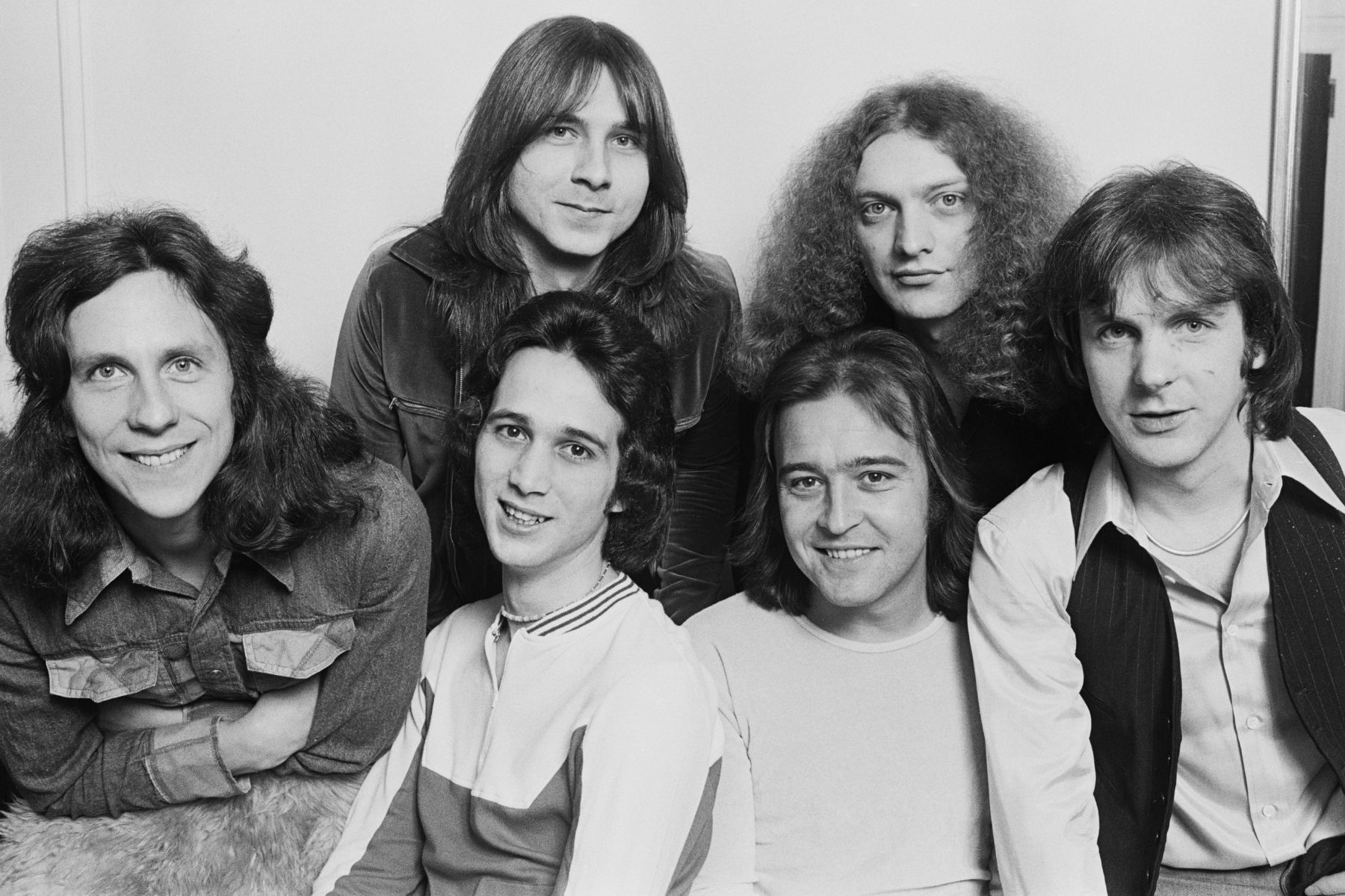British-American rock group Foreigner, New York, 7th February 1977. Clockwise from far right: drummer Dennis Elliott, keyboard player Al Greenwood, singer Lou Gramm, rhythm guitarist Ian McDonald, lead guitarist Mick Jones and bassist Ed Gagliardi