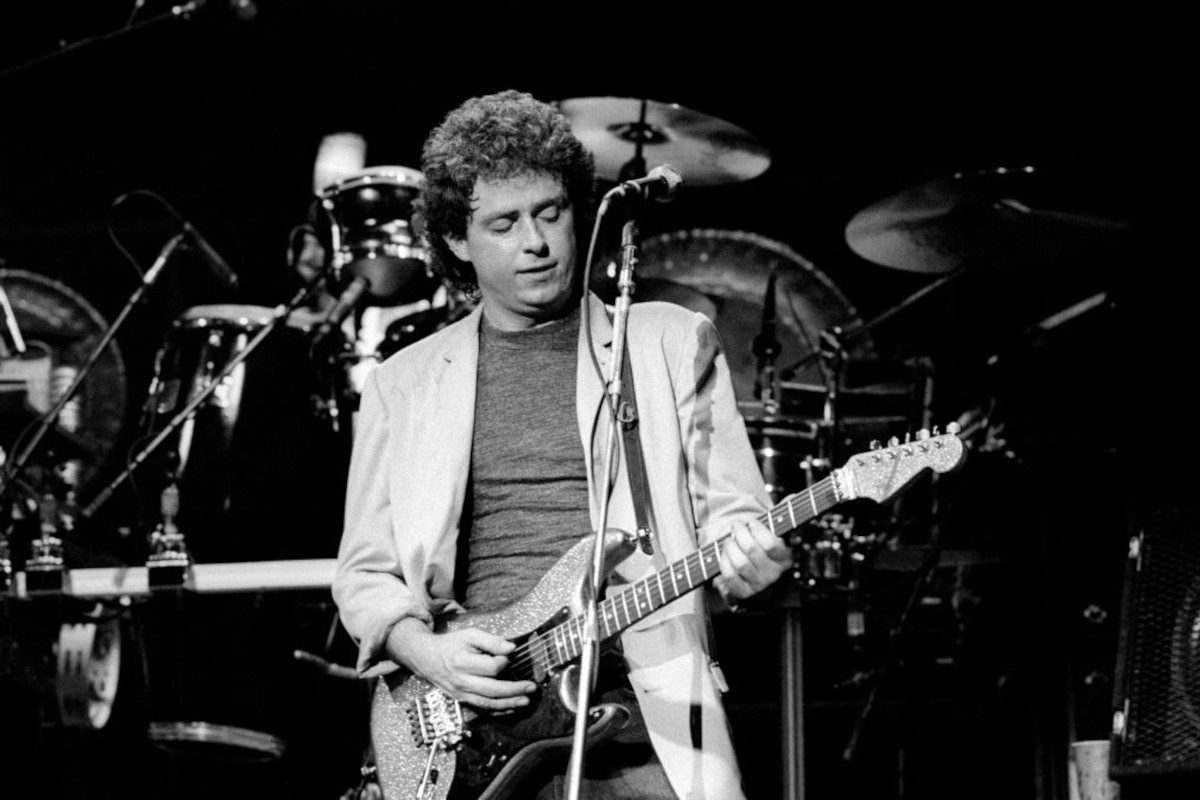 Steve Lukather, of Toto, performing on stage, circa 1988