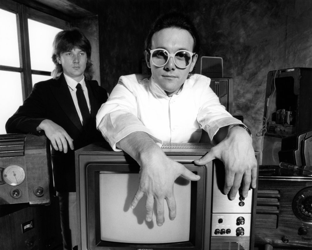 The Buggles, 1979. L-R Geoff Downes and Trevor Horn, with TV set and radios