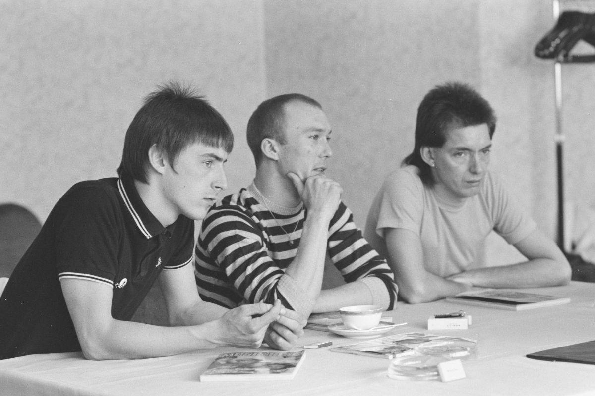 The Jam look thoughtful, Tokyo, 14 June 1982. L-R Paul Weller, Rick Buckler, Bruce Foxton