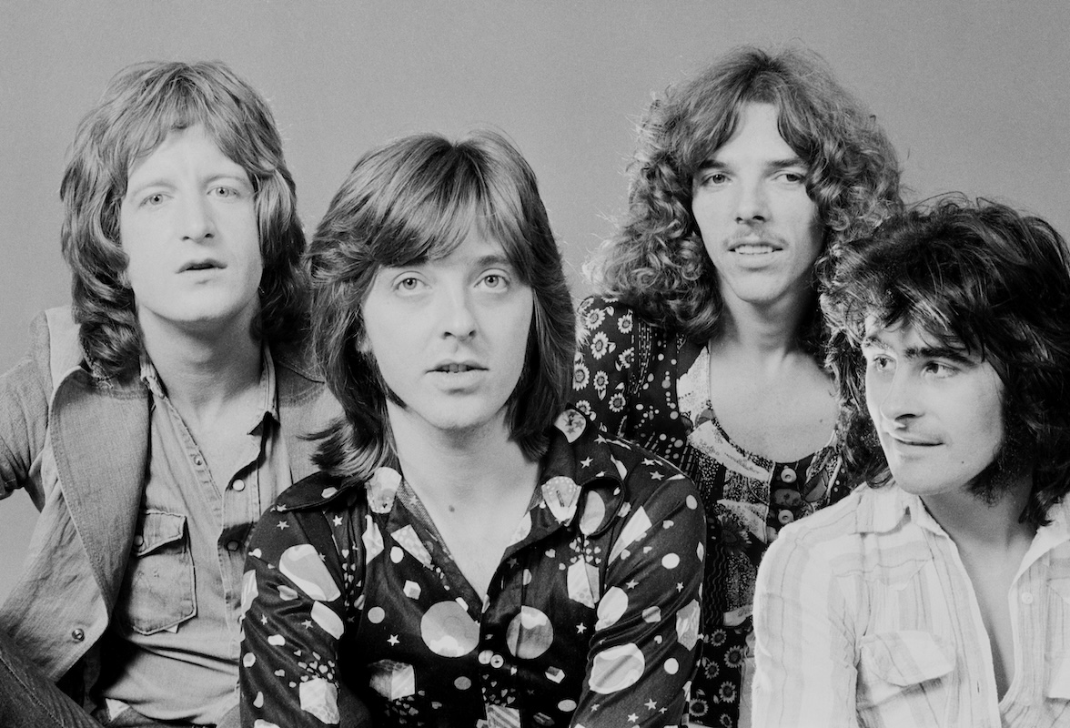 Black and white photo of Badfinger in a studio