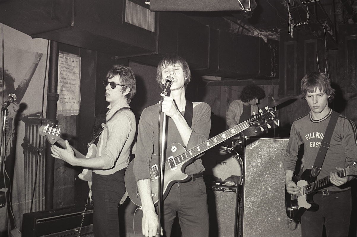 Black and white photo of Television perform live at CBGB in New York in 1975