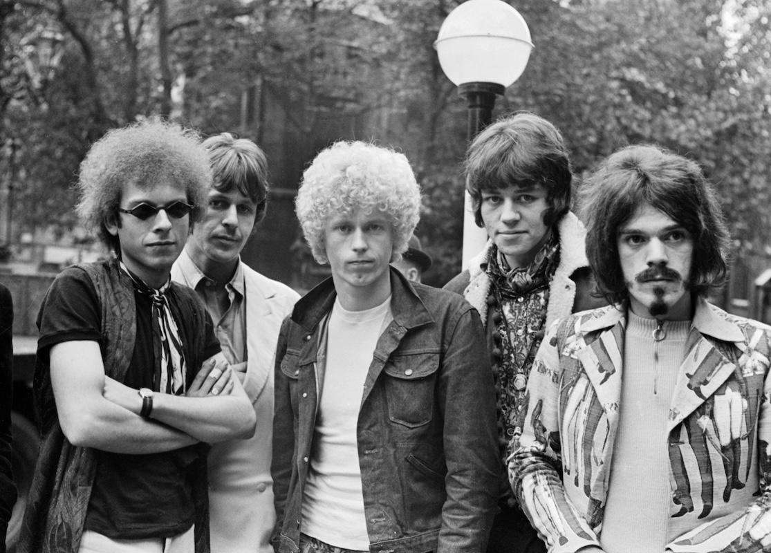 Black and white photo of Pop Group 'The Move' outside the law courts, 1967