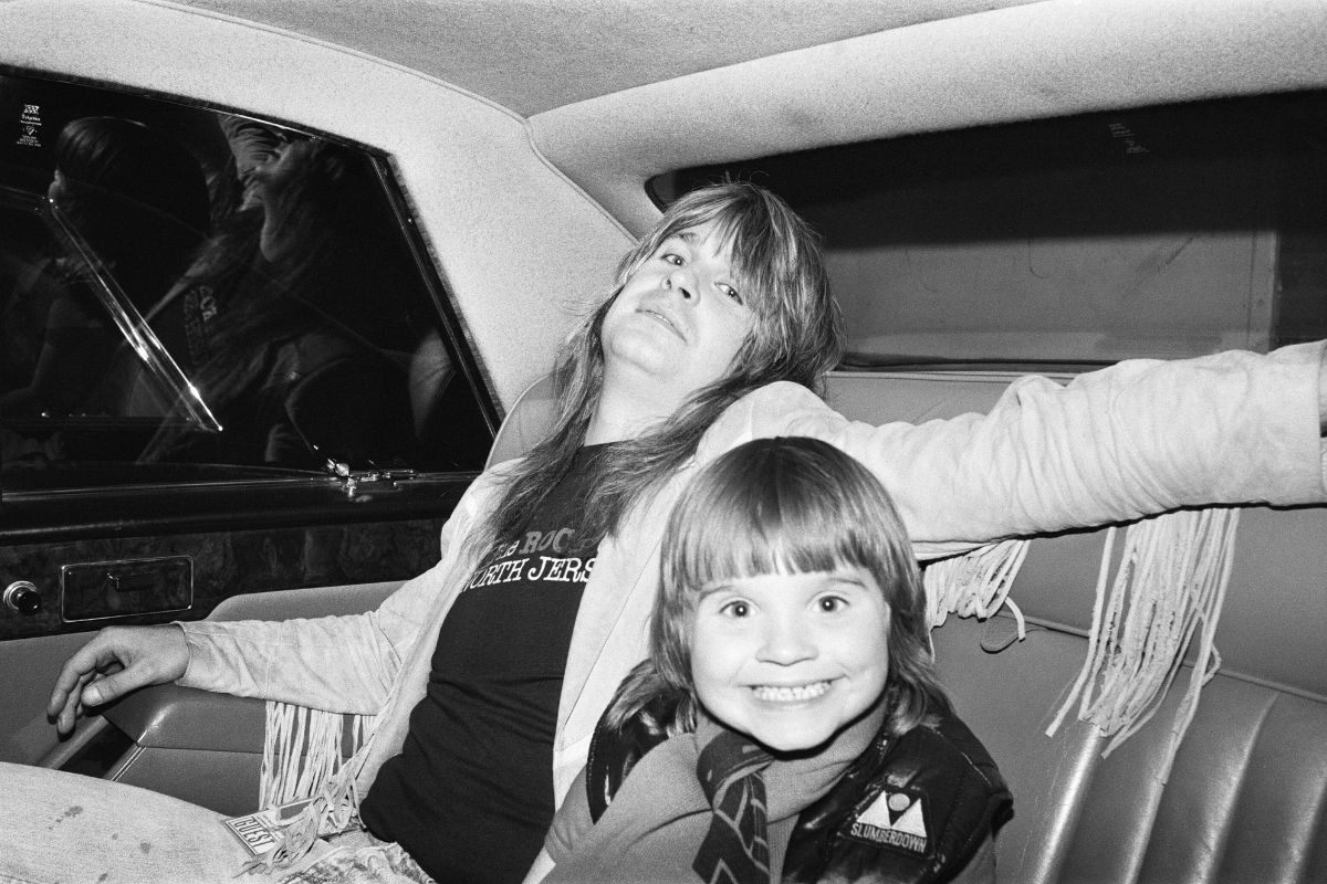 Ozzy Osbourne, of Black Sabbath, pictured in a car with son Louis Osbourne. 3rd August 1981