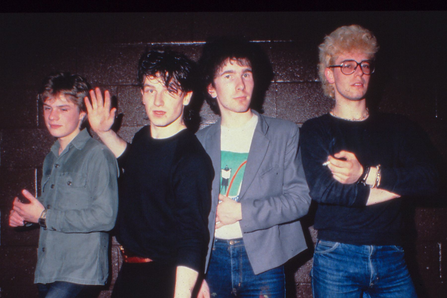 Irish rock band U2 on their first U.S. tour pose backstage March 20, 1981 at the Old Waldorf in San Francisco, California. Left to right: Adam Clayton, Bono, The Edge, Larry Mullen Jr