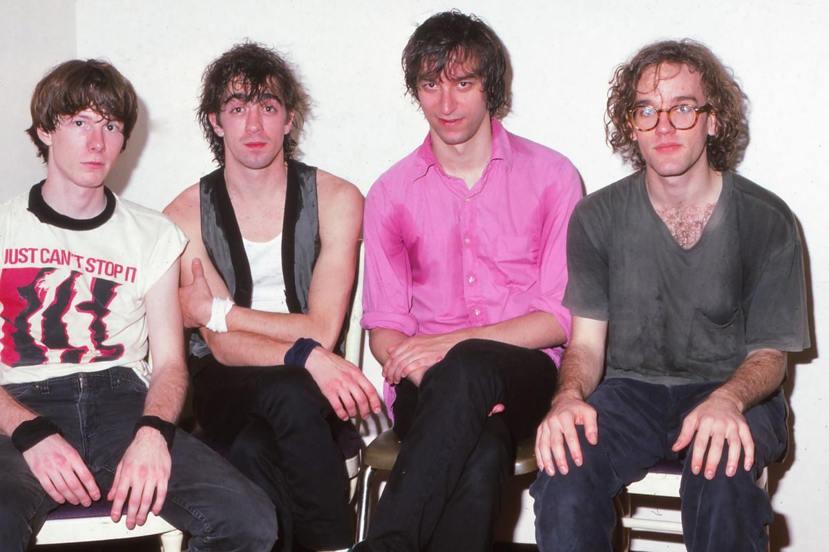 REM backstage at the Kabuki Theater, November 11, 1983, San Francisco, California. L-R Mike Mills, Bill Berry, Peter Buck, Michael Stipe