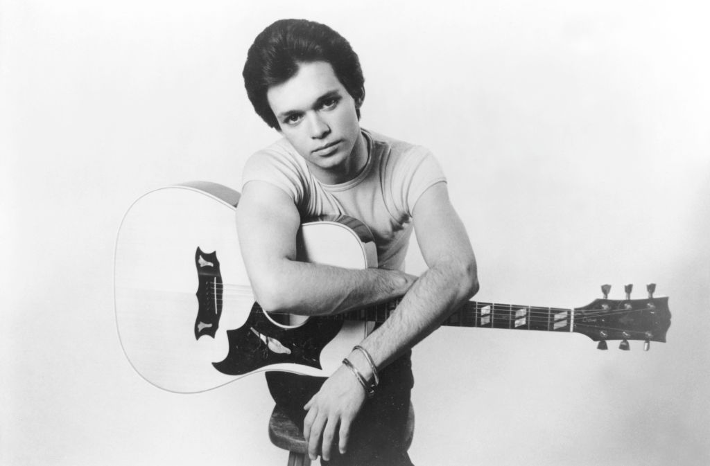 Johnny Cougar poses for a publicity photo for his debut album, 1976