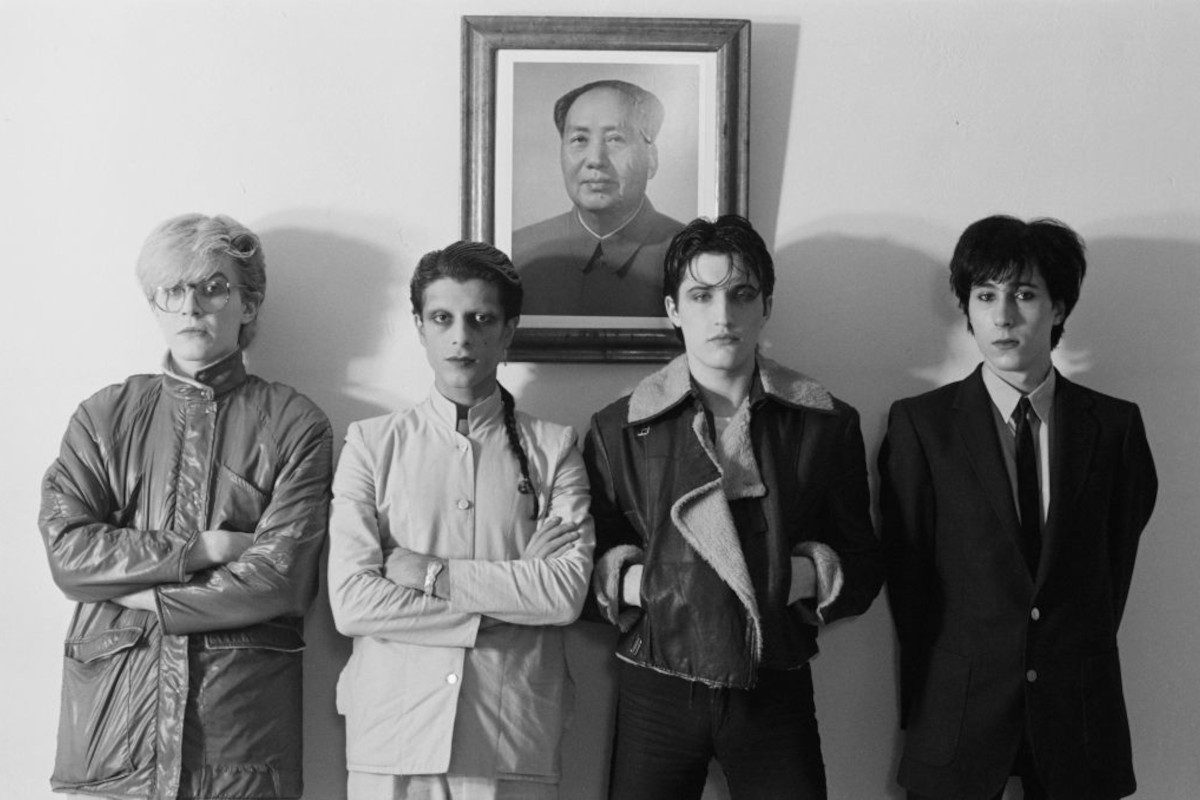 Japan posed standing in front of a portrait of Chairman Mao during the Tin Drum sessions in London in September 1981