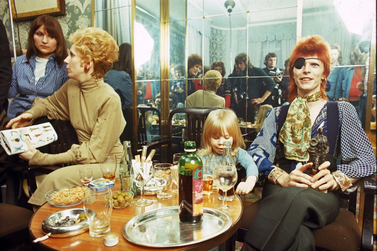 Angie Bowie, Zowie Bowie (Duncan Jones) and David Bowie (with eyepatch), Amstel Hotel, Amsterdam, 7 February 1974
