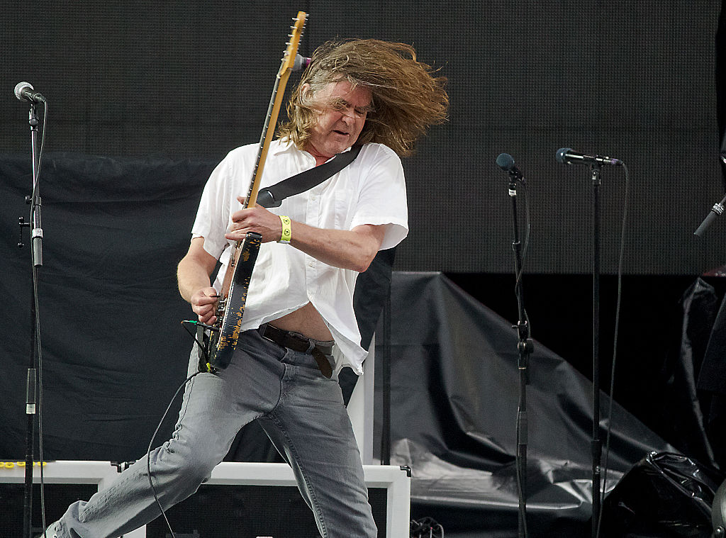 Founding guitarist Roger Miller performs with Mission of Burma, opening for the Foo Fighters, at Fenway Park in Boston, 18 July 2015