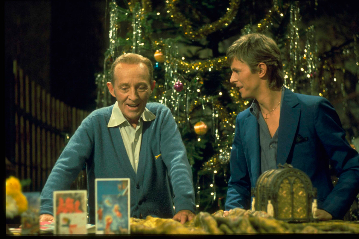 Bing Crosby and David Bowie performing a medley of the songs 'Little Drummer Boy' and 'Peace On Earth' on the set of the television special Bing Crosby's Merrie Olde Christmas, circa 1977