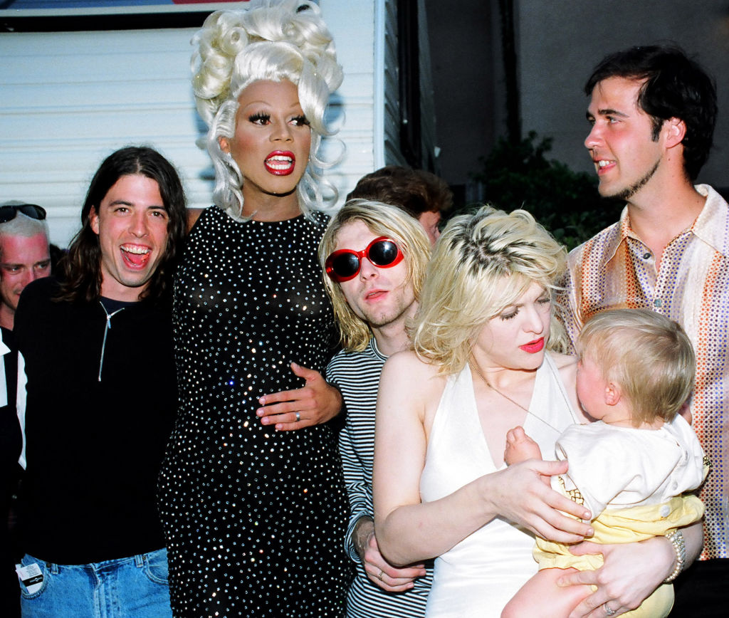 Dave Grohl, Kurt Cobain and Krist Novoselic of Nirvana, with Courtney Love and daughter Frances Bean Cobain, plus drag artist RuPaul, at the 1993 MTV Video Music Awards