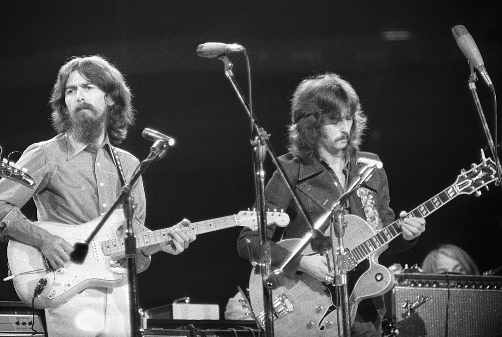 George Harrison and Eric Clapton performing at the Concert for Bangladesh at Madison Square Garden, 1971