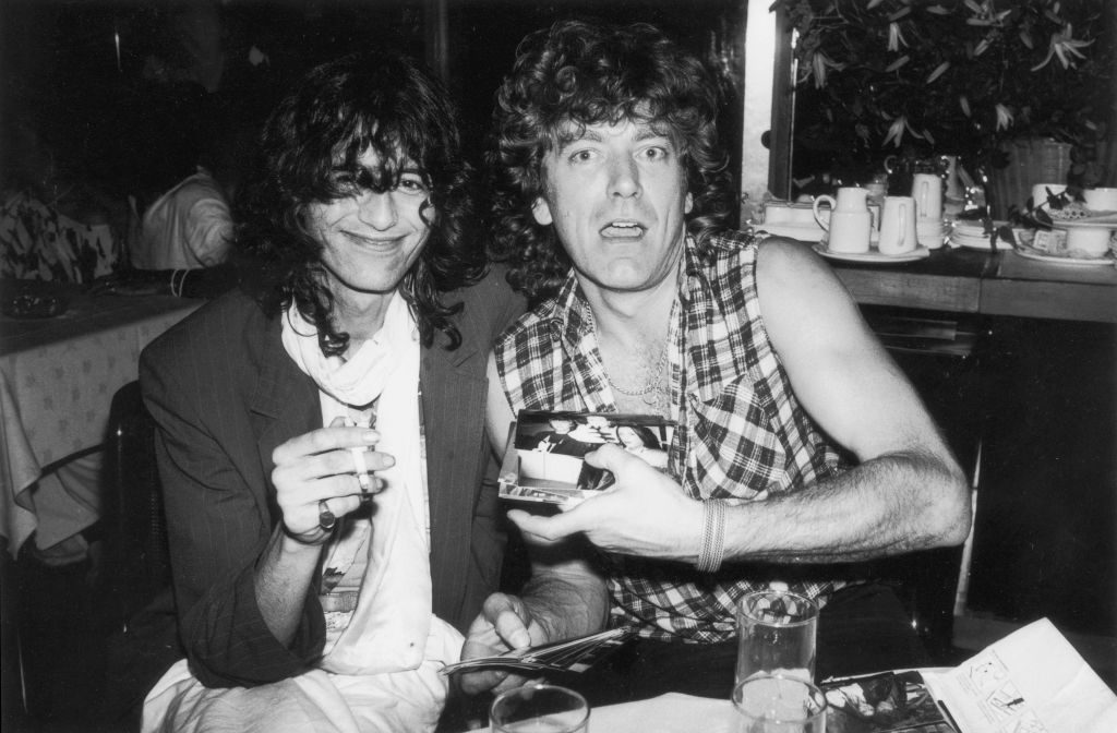 Jimmy Page (left) and Robert Plant of Led Zeppelin at Stringfellow's nightclub, London, 1980