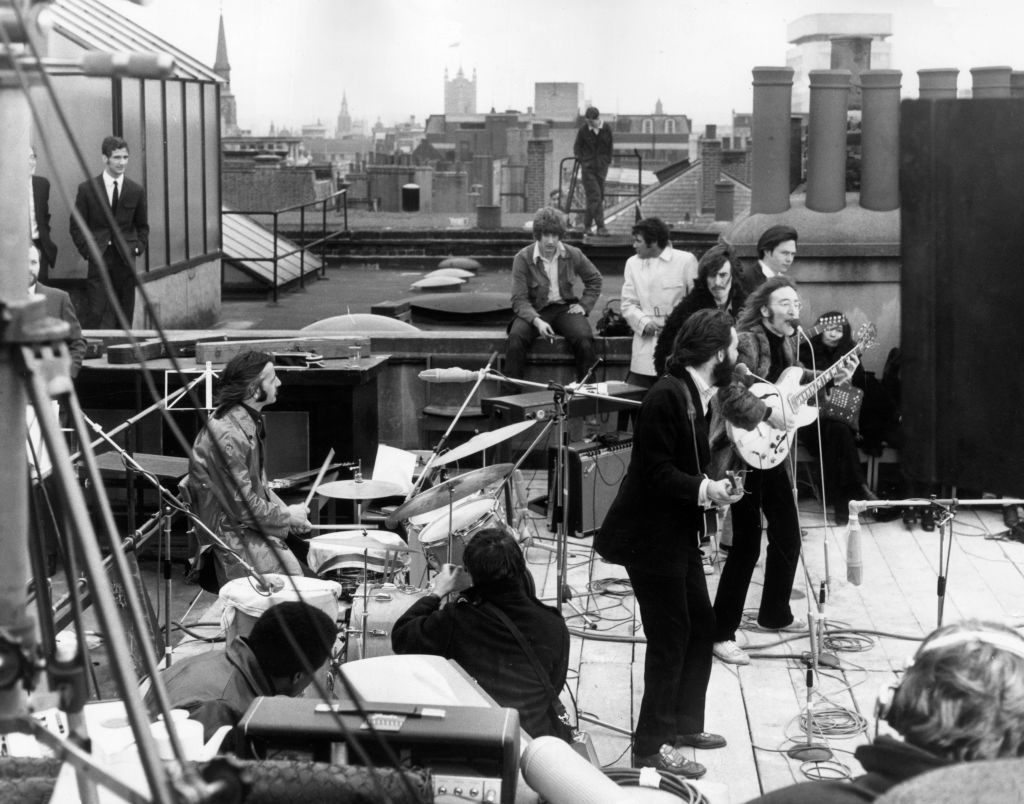 The Beatles performing their last live public concert on the rooftop of the Apple Organization building for director Michael Lindsey-Hogg's film documentary, 'Let It Be,' Savile Row, London, 30 January 1969