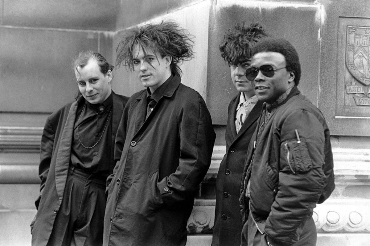 The Cure posing for a band portrait, 1984