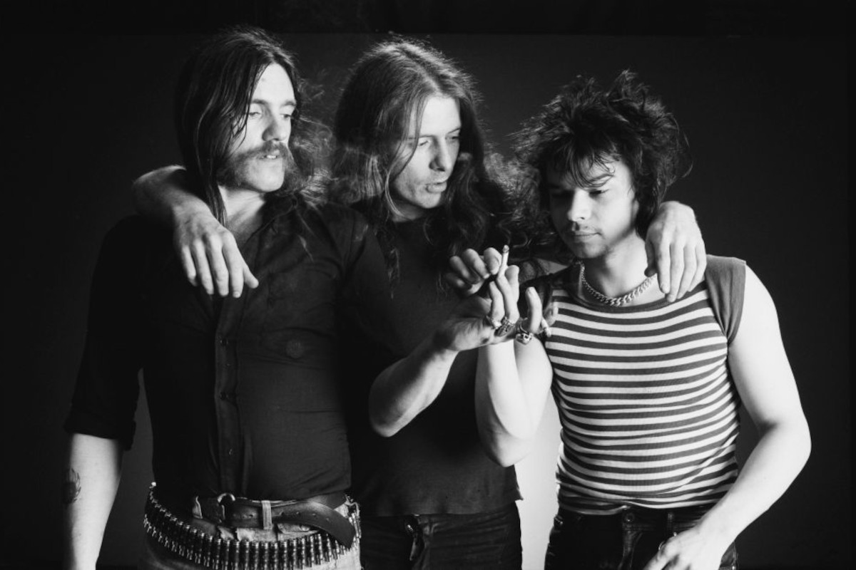 Motörhead (from left: Lemmy Kilmister, Eddie Clarke and Phil Taylor), in a group studio portrait, circa 1978