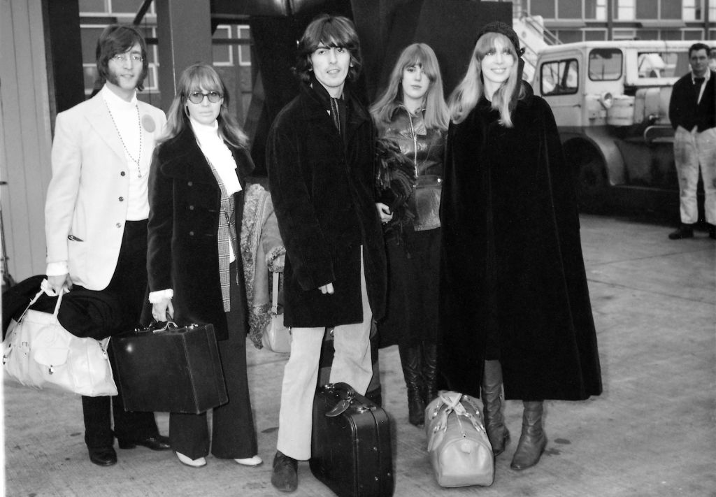 John Lennon and George Harrison with their wives Cynthia Lennon (far left) and Patti Boyd (far right), plus Patti's younger sister Jenny, departing for Rishikesh, February 1968