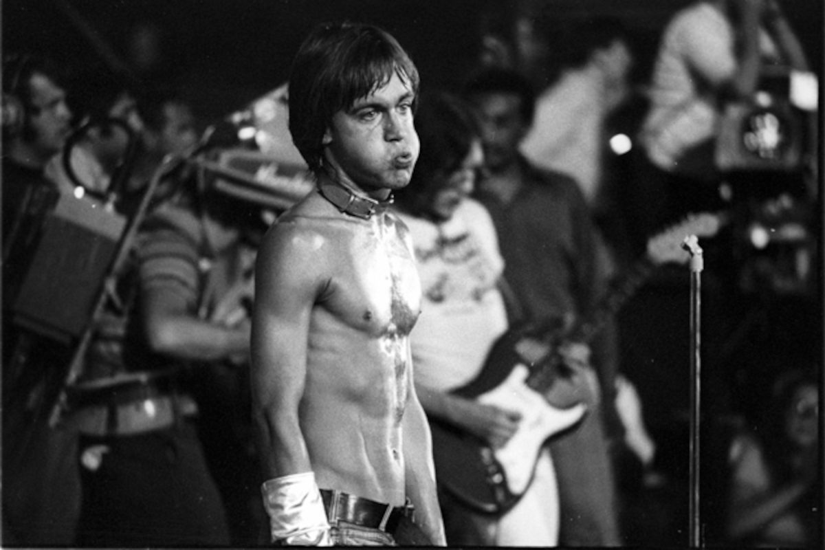 Iggy Pop wearing a dog collar on stage with The Stooges at the Cincinnati Pop Festival at Crosley Field, Cincinnati, Ohio, 13th June 1970