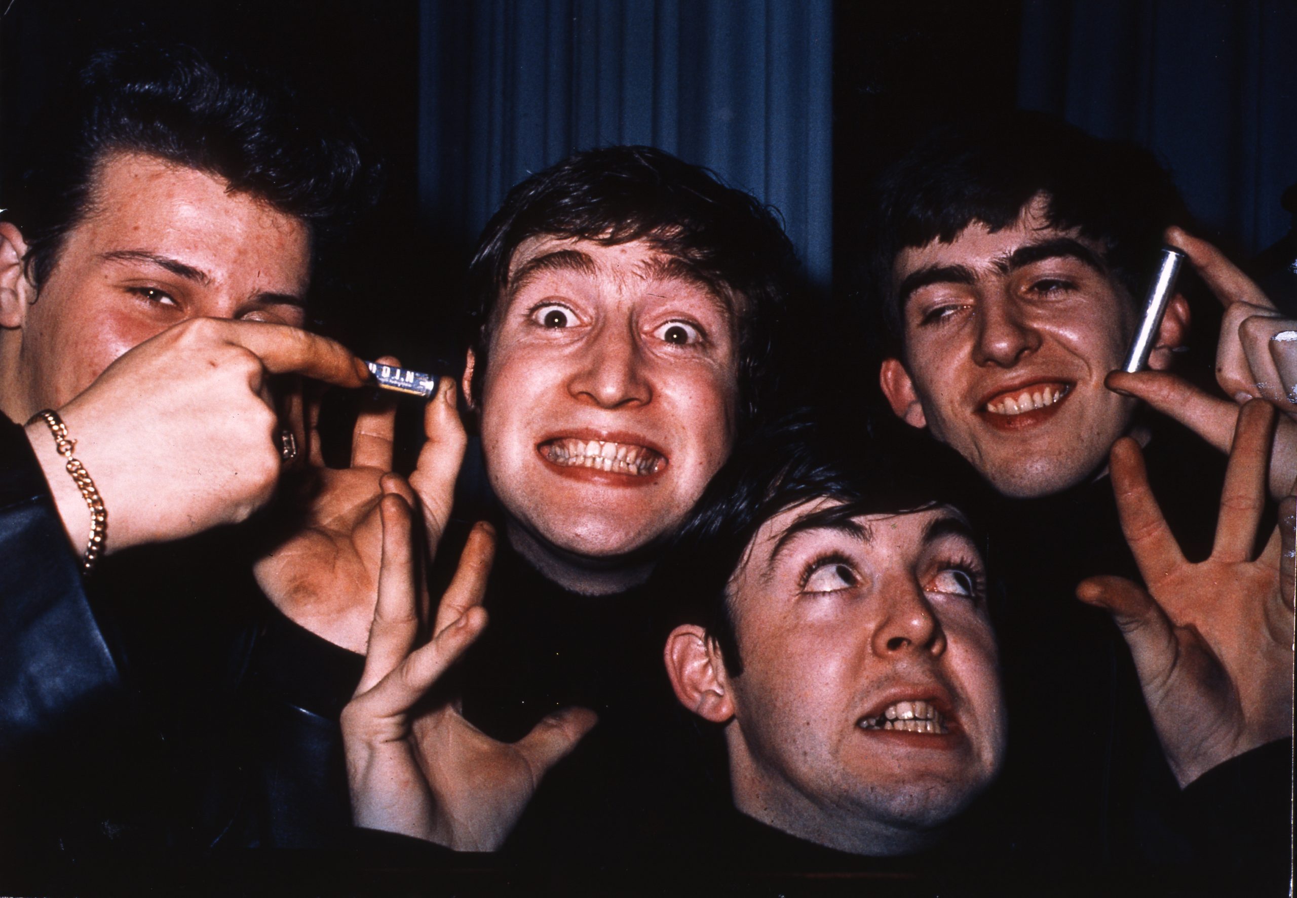 Beatles close up looking at the camera