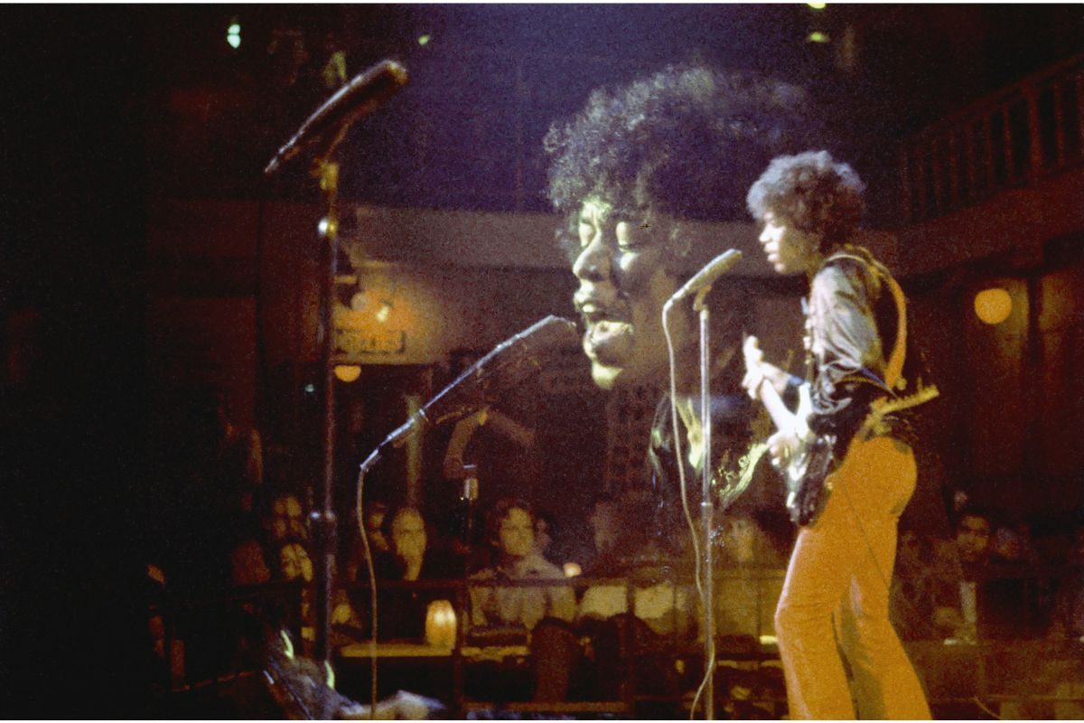 Guitarist Jimi Hendrix performs onstage in 1968