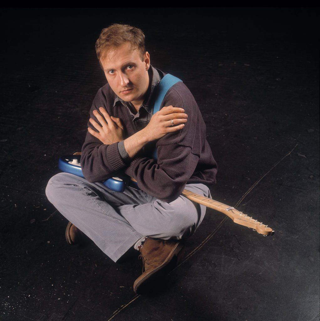 Portrait of singer Bob Mould, previously of Husker Du, backstage at the Metro in Chicago, Illinois, May 14, 1989