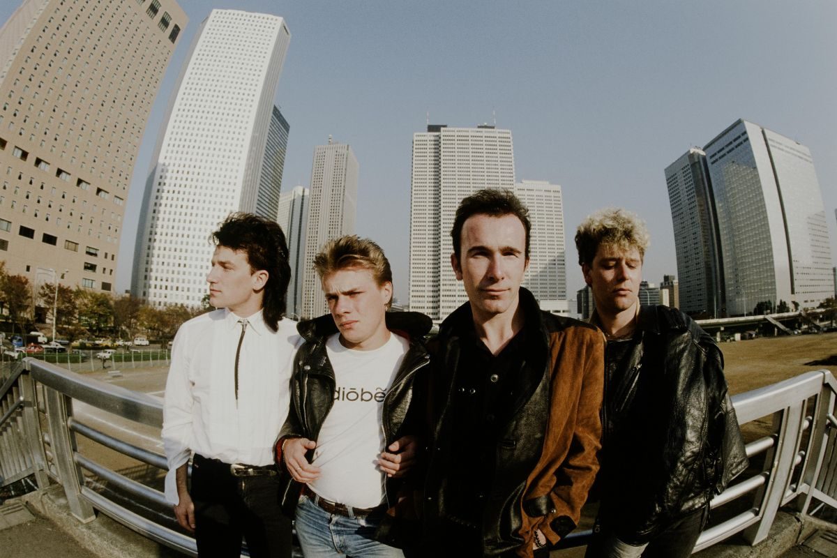 U2 surrounded by high-rise buildings in Shinjuku, Tokyo, November 1983