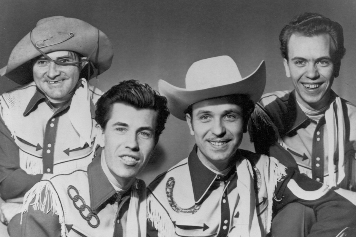 Rock and roll guitarist Link Wray (front left) poses for a portrait with his band, Link Wray and the Wraymen, in 1958