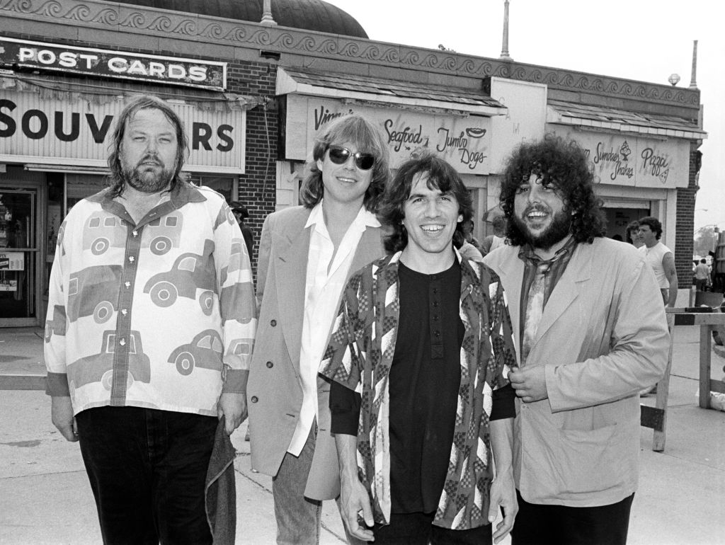 NRBQ at a WNEW Radio event in Asbury Park, New Jersey on May 22, 1987. Left to right Al Anderson, Terry Adams, Joey Spampinato and Tom Ardolino