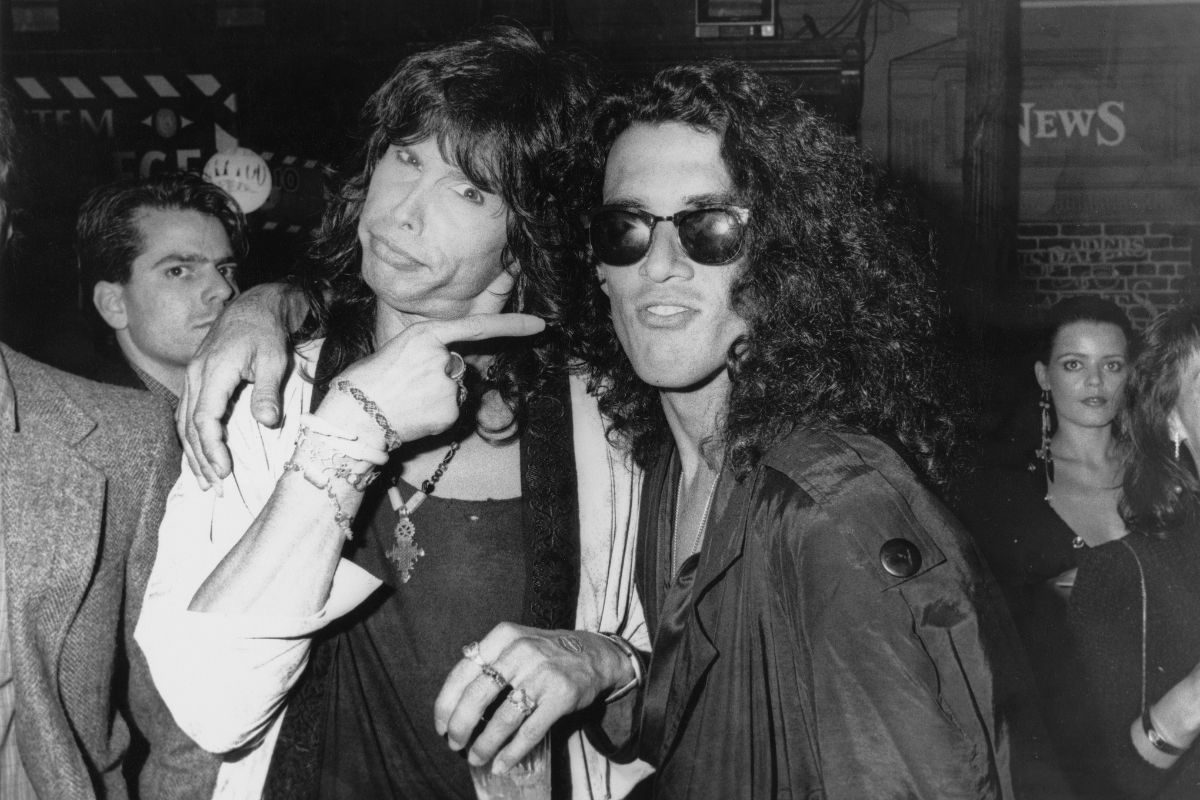 Steven Tyler (left) after performing 'Walk This Way' at the MTV Awards closing ceremony, Los Angeles, 1987