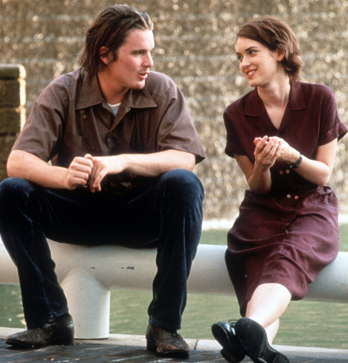 Ethan Hawke sits with Winona Ryder in a scene from the film 'Reality Bites', 1994