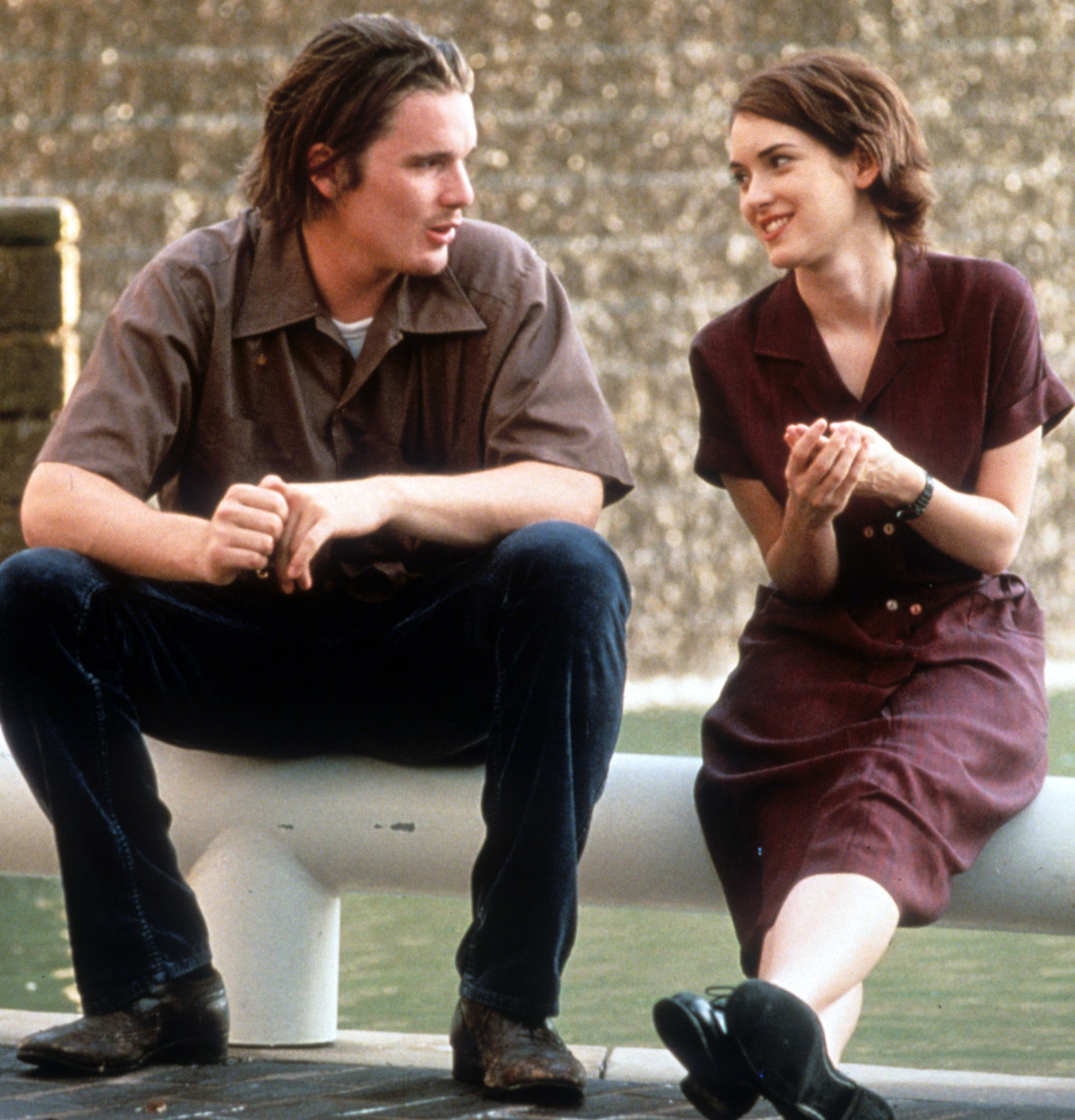 Ethan Hawke sits with Winona Ryder in a scene from the film 'Reality Bites', 1994