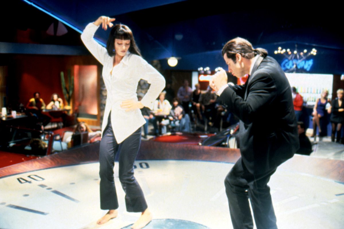 American actors Uma Thurman and John Travolta dancing during a scene in the film 'Pulp Fiction', 1994