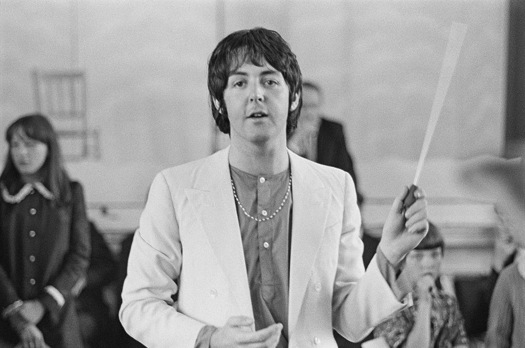 Paul McCartney records the Lennon-McCartney composition 'Thingumybob' with the Black Dyke Mills Band in Saltaire, City of Bradford, West Yorkshire, 30th June 1968