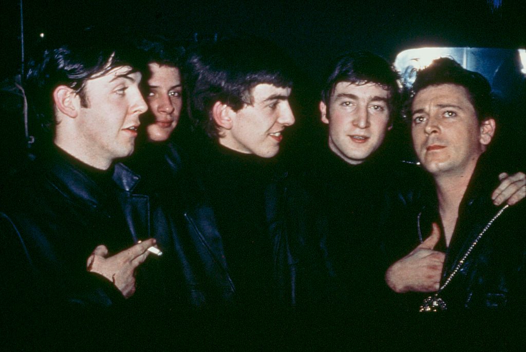 The Beatles with American rock and roll musician Gene Vincent at the Star Club, Hamburg, April-May 1962. Left to right: Paul McCartney, original drummer Pete Best, George Harrison, John Lennon and Vincent