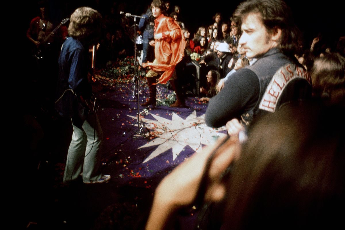 Rolling Stones at Altamont: L-R guitarist Mick Taylor, singer Mick Jagger and Hell's Angels guarding the stage