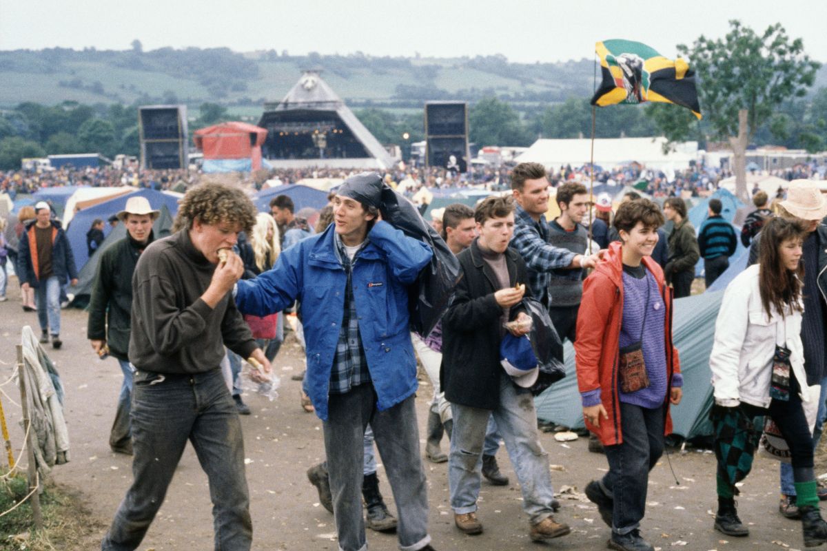 Audience members walking away from the Pyramid Stage at the 1990 Glastonbury Festival