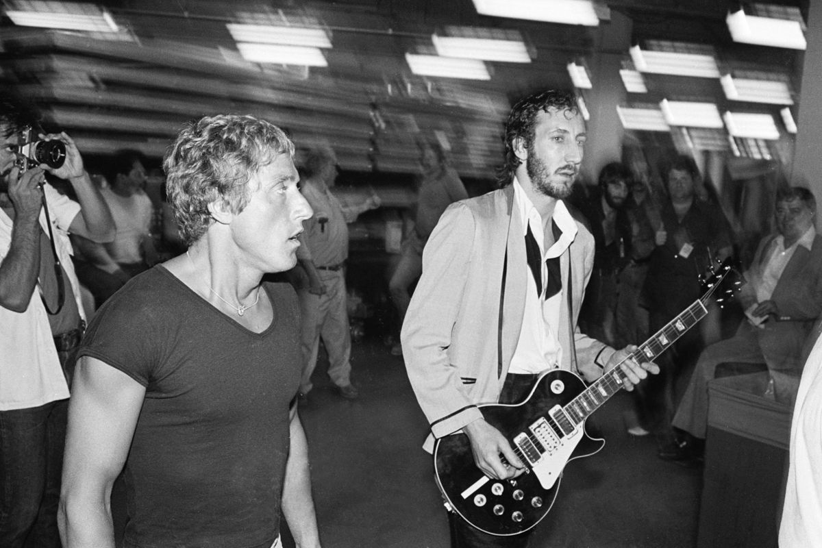 Roger Daltrey (left) and Pete Townshend of The Who, walk backstage at Madison Square Garden, New York, March 3, 1976