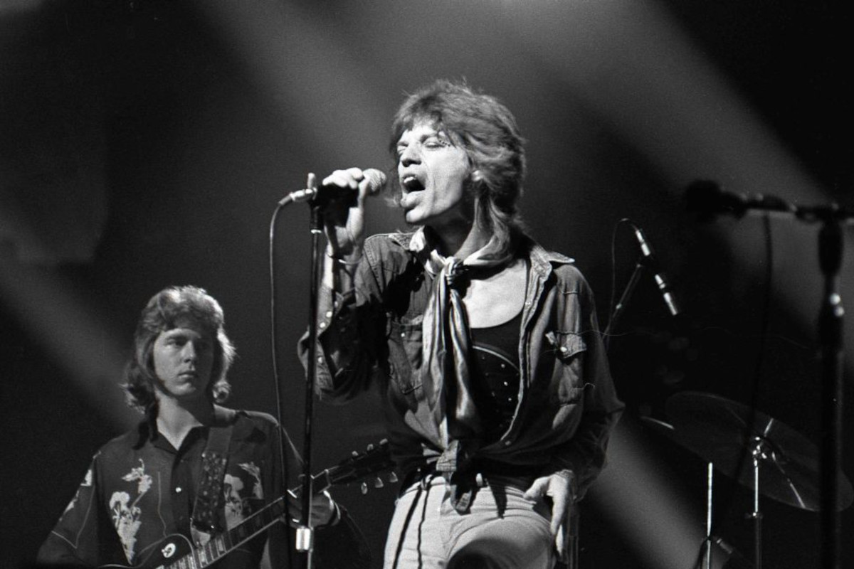 Mick Taylor and Mick Jagger performing live onstage, 1972