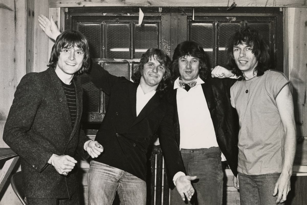 Progressive rock group Asia, portrait at the Palladium, New York, 2 May 1982. (L-R) Carl Palmer (drums), John Wetton (1949-2017) (vocals and bass), Geoff Downes (keyboards), Steve Howe (guitar)