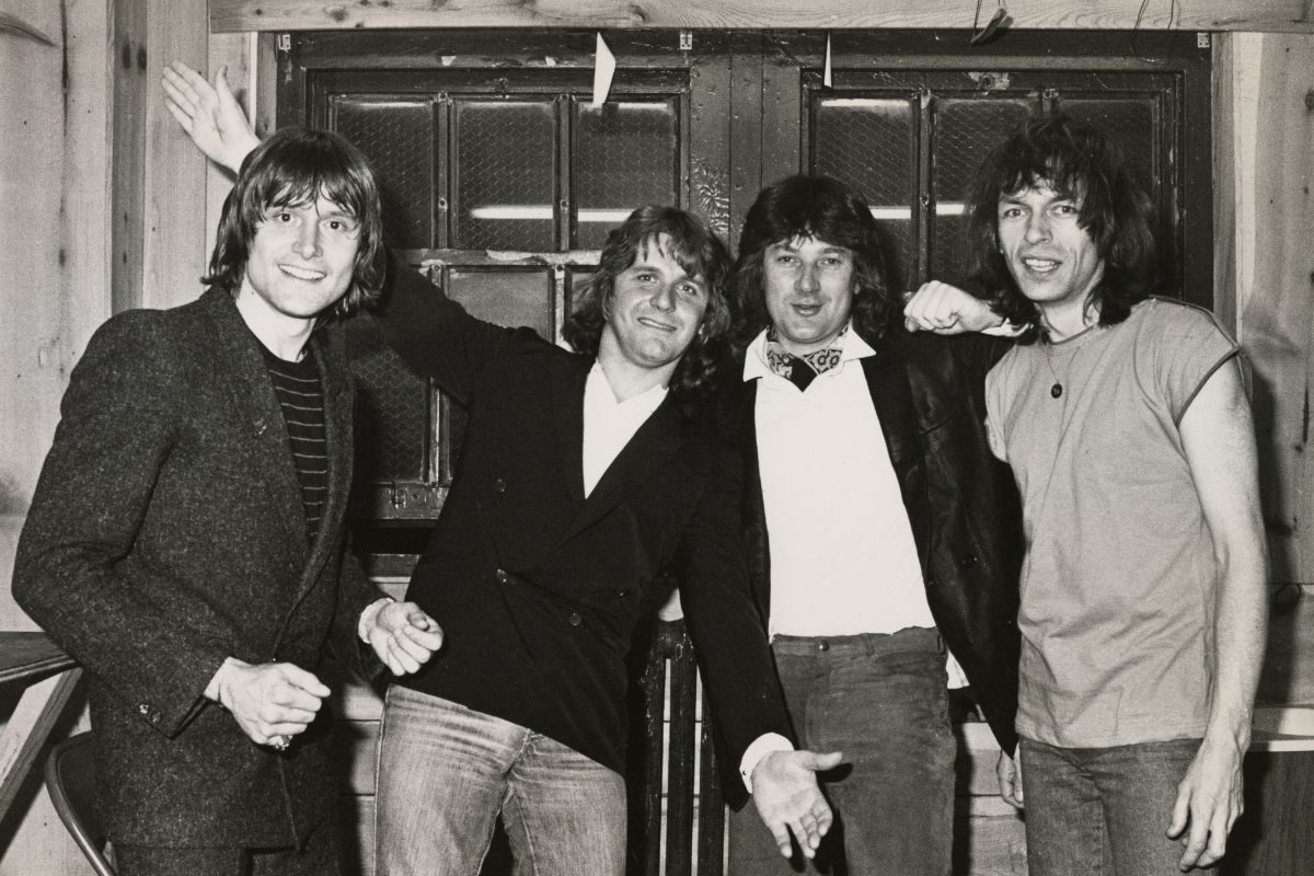 Progressive rock group Asia, portrait at the Palladium, New York, 2 May 1982. (L-R) Carl Palmer (drums), John Wetton (1949-2017) (vocals and bass), Geoff Downes (keyboards), Steve Howe (guitar)